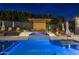 Inviting pool and spa area with a pergola and plenty of seating at 7223 N Black Rock Trl, Paradise Valley, AZ 85253
