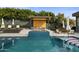 Luxury pool with spa, pergola, and ample lounge space at 7223 N Black Rock Trl, Paradise Valley, AZ 85253