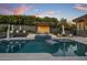 Relaxing pool and patio with a wooden pergola and lounge chairs at 7223 N Black Rock Trl, Paradise Valley, AZ 85253