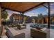 Relaxing poolside patio with covered seating and a spa at 7223 N Black Rock Trl, Paradise Valley, AZ 85253