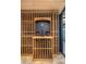 Custom built-in wine cellar with wooden racks at 7223 N Black Rock Trl, Paradise Valley, AZ 85253