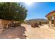Inviting backyard with desert landscape, stone patio, sparkling pool and mountain views at 7929 N 55Th St, Paradise Valley, AZ 85253