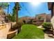 Backyard with artificial turf and desert landscaping at 7929 N 55Th St, Paradise Valley, AZ 85253