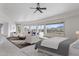 Staged bedroom features scenic views, carpet, ceiling fan, and stylish furniture at 7929 N 55Th St, Paradise Valley, AZ 85253