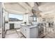 Spacious kitchen features a large island, breakfast bar, and mountain views at 7929 N 55Th St, Paradise Valley, AZ 85253