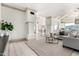 Bright living room with tall columns and views of the interior entryway at 7929 N 55Th St, Paradise Valley, AZ 85253