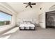 Spacious main bedroom offers stunning views from the large windows and ample natural light at 7929 N 55Th St, Paradise Valley, AZ 85253