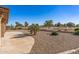 Spacious backyard with flagstone patio, overlooking a golf course at 9447 W Tonto Ln, Peoria, AZ 85382