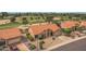 Charming home with a terra cotta roof, desert landscaping, and an attached two-car garage at 9447 W Tonto Ln, Peoria, AZ 85382