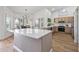 Modern kitchen with quartz countertops and light beige cabinets at 9447 W Tonto Ln, Peoria, AZ 85382