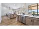 Modern kitchen with stainless steel appliances and light taupe cabinets at 9447 W Tonto Ln, Peoria, AZ 85382