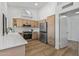 Bright kitchen with stainless steel appliances and ample counter space at 9447 W Tonto Ln, Peoria, AZ 85382