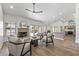 Bright living room with fireplace, hardwood floors and access to backyard at 9447 W Tonto Ln, Peoria, AZ 85382