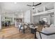 Open concept living space with hardwood floors and kitchen views at 9447 W Tonto Ln, Peoria, AZ 85382