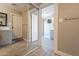 Gray-toned bathroom with mirrored closet and laundry access at 1014 S 2Nd St, Phoenix, AZ 85004