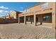 Spacious patio with brick pavers and covered area at 11131 W Mariposa Dr, Phoenix, AZ 85037