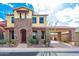 Two-story house with stone accents and desert landscaping at 11607 N 12Th Ter, Phoenix, AZ 85020