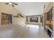 Bright dining area with tile floors and view to backyard at 13051 W Blue Sky Dr, Sun City West, AZ 85375