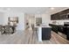 Open concept kitchen with island and stainless steel appliances at 1344 W Inca Dr, Coolidge, AZ 85128