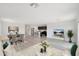 Spacious living room with open floor plan and adjacent kitchen at 1344 W Inca Dr, Coolidge, AZ 85128