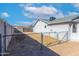 Large backyard with a chain link fence and gravel at 1363 N Terripin St, Mesa, AZ 85207