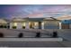 Single story home with updated landscaping at dusk at 1363 N Terripin St, Mesa, AZ 85207