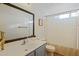 Simple bathroom with updated vanity and patterned shower curtain at 1409 E Harvest Rd, San Tan Valley, AZ 85140