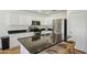 Kitchen boasts stainless steel appliances and a large island at 1409 E Harvest Rd, San Tan Valley, AZ 85140