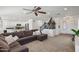 Open concept living room, kitchen, and stairs at 1409 E Harvest Rd, San Tan Valley, AZ 85140