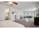 Large main bedroom with ensuite bathroom and crib at 1409 E Harvest Rd, San Tan Valley, AZ 85140