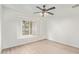 Bedroom with laminate wood floor and ceiling fan at 1427 E Irwin Ave, Phoenix, AZ 85042