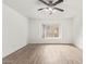 Bedroom featuring laminate floors and a large window at 1427 E Irwin Ave, Phoenix, AZ 85042