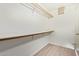 Spacious closet with built-in shelves and hanging rod at 1427 E Irwin Ave, Phoenix, AZ 85042