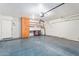 Garage with storage shelves and workbench at 1427 E Irwin Ave, Phoenix, AZ 85042