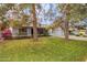 House front showcasing landscaping and driveway at 1427 E Irwin Ave, Phoenix, AZ 85042
