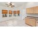 Kitchen with light wood cabinets and granite countertops at 1427 E Irwin Ave, Phoenix, AZ 85042