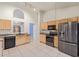 Modern kitchen with stainless steel appliances and ample cabinet space at 1427 E Irwin Ave, Phoenix, AZ 85042
