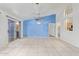 Bright living room with tile floors and sliding glass door at 1427 E Irwin Ave, Phoenix, AZ 85042