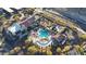 Aerial view of community pool, clubhouse, and surrounding area at 14952 S 184Th Ave, Goodyear, AZ 85338