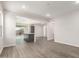 Modern kitchen with island and grey cabinetry at 17449 W El Caminito Dr, Waddell, AZ 85355