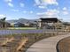 Community basketball court with ramada and mountain views for recreational activities at 17636 W Pierson St, Goodyear, AZ 85395