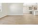 Open-concept living room showcasing modern fixtures, an open kitchen, and tile flooring at 17636 W Pierson St, Goodyear, AZ 85395