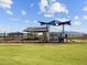 A colorful playground offers a fun and safe area for children to play and socialize in the community at 17636 W Pierson St, Goodyear, AZ 85395