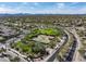Aerial view of community tennis courts and neighborhood at 18391 N 97Th Pl, Scottsdale, AZ 85255
