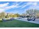 Spacious backyard with a pool, patio, and mountain views at 18391 N 97Th Pl, Scottsdale, AZ 85255
