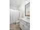 Bathroom with a shower/tub combo and modern vanity at 18391 N 97Th Pl, Scottsdale, AZ 85255