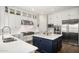Modern kitchen with stainless steel appliances and a large island at 18391 N 97Th Pl, Scottsdale, AZ 85255