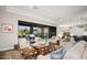 Living room with sliding doors opening to the backyard oasis at 18391 N 97Th Pl, Scottsdale, AZ 85255