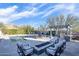 Cozy patio with fire pit and comfortable seating at 18391 N 97Th Pl, Scottsdale, AZ 85255