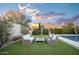 Relaxing poolside patio furniture with mountain views at 18391 N 97Th Pl, Scottsdale, AZ 85255